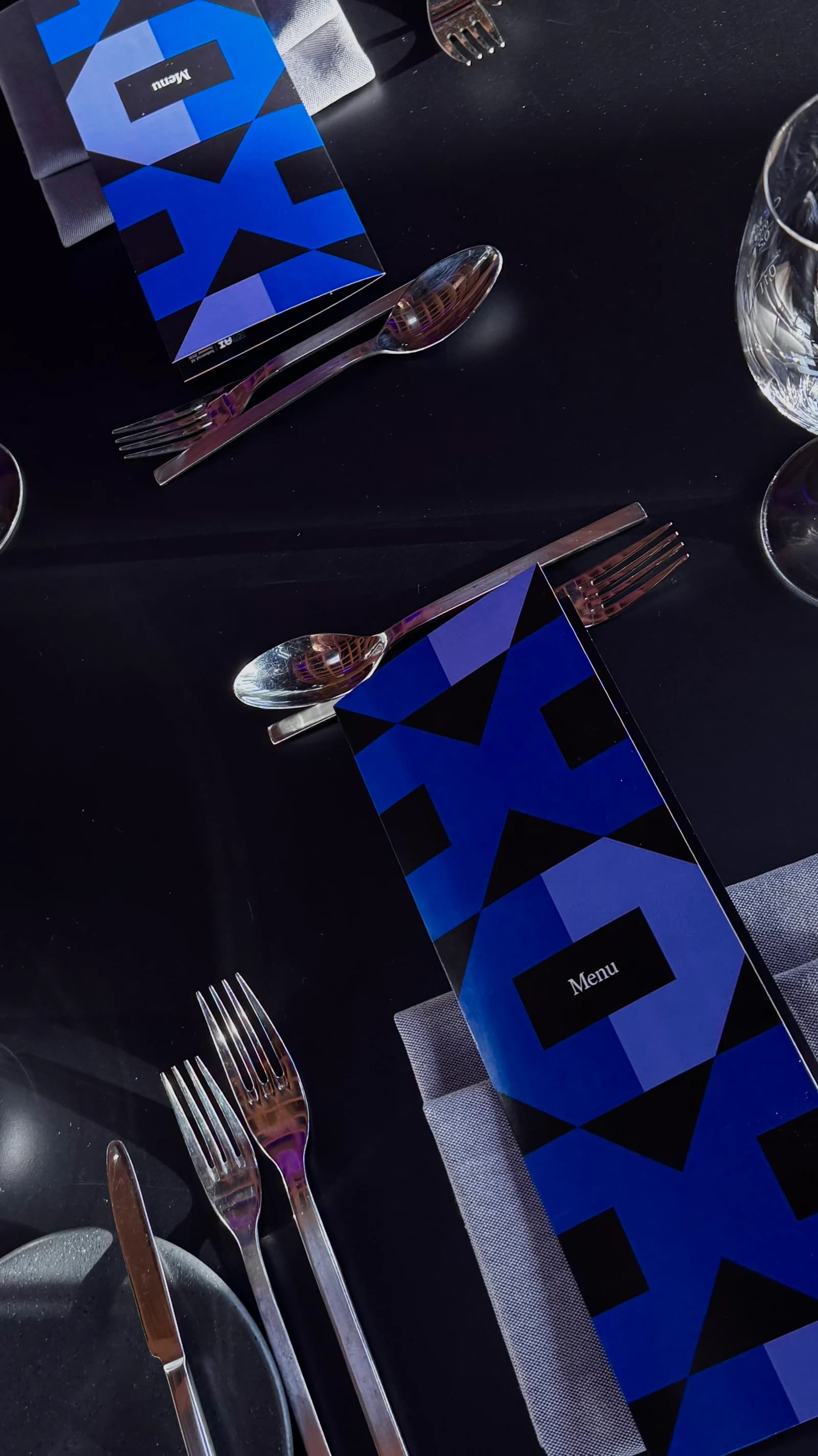 Industrial AI Summit 2026 menus placed at a dinner table