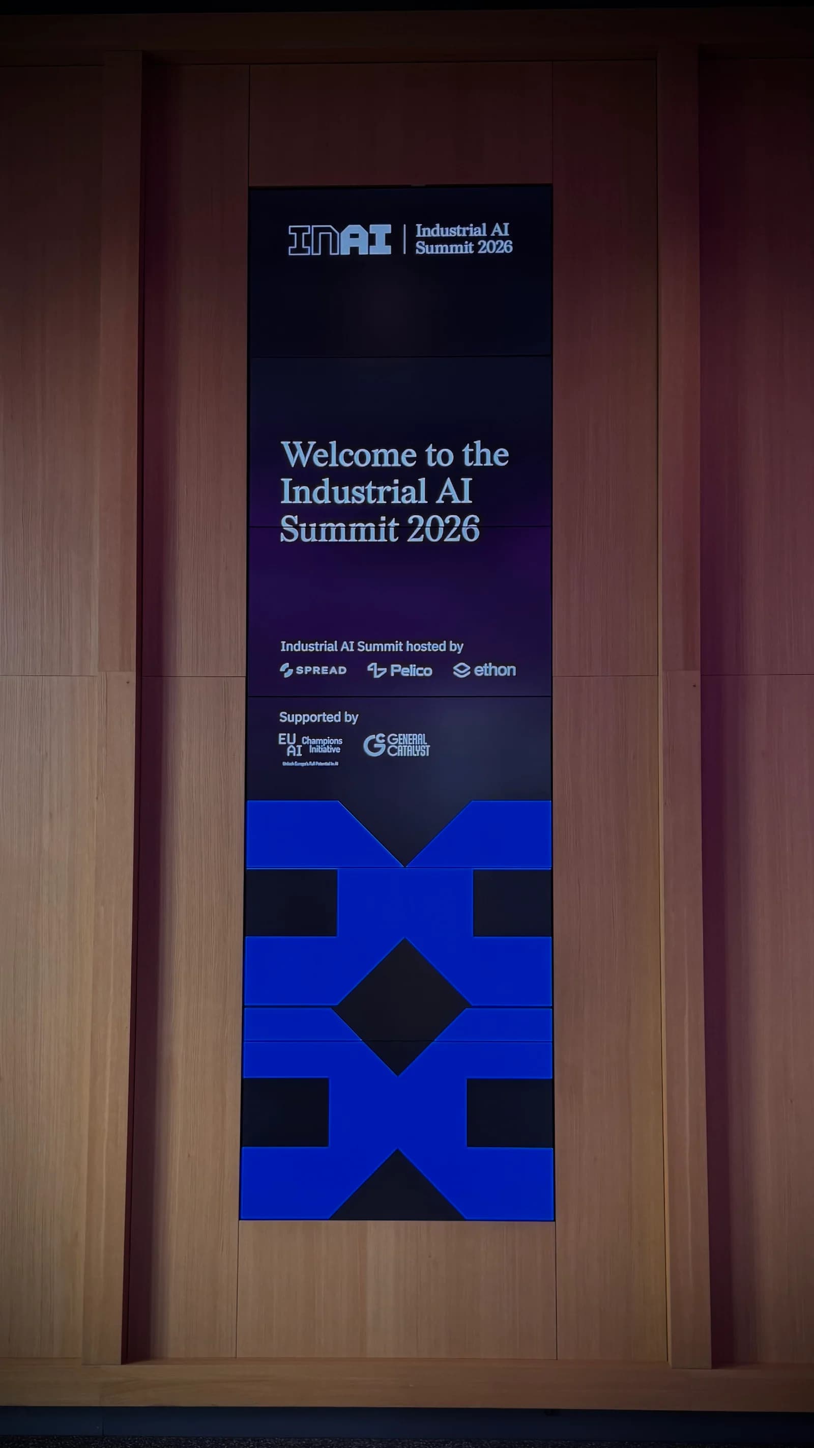 Tall digital welcome screen for Industrial AI Summit 2026
